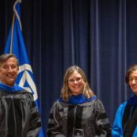 Provost posing with 2 faculty members